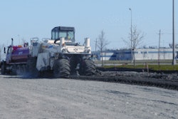 Midstate used a Wirtgen 2500 reclaimer to blend a cement additive and water with the soft soil to stabilize the parking area of the project.