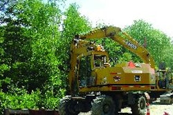 The Lane Construction Corp. uses wheeled excavators for added mobility and ease of travel.