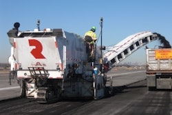 A Roadtec milling machine bulks-mills 4 inches of material without laser grade-control cross referencing before making the finished pass.