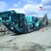 The Pegson XH320SR is shown at work crushing concrete rubble at one of Ghilotti Brothers' four recycling yards.