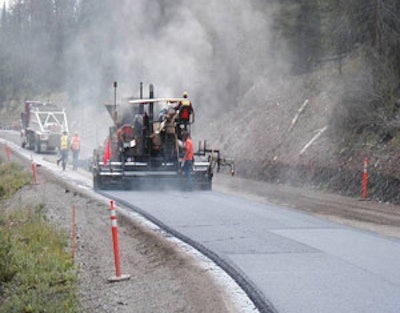 The hot mix asphalt produces smoke behind the paver while the warm mix asphalt is smoke free.