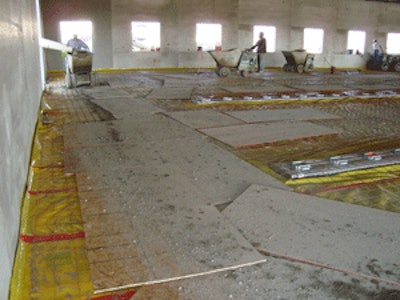 Vapor retarders hold up to a reasonable amount of concrete buggy traffic, but it's a good idea to protect main traffic aisles during a pour, especially if you're using a crushed aggregate rock under the retarder. Plywood boards are a popular method for protecting vapor retarders in heavy traffic areas.