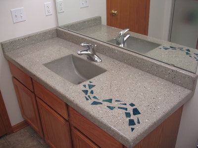 Nick Coello of Concrete Interiors created this 6-foot by 26-inch concrete bathroom countertop in one, seamless, precast piece.
