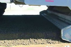 In the case of the Hwy. 166 project, cement was spread over the original road prior to recycling to provide additional structure and strength to the materials being mixed and compacted.