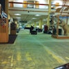 Grand Prospect crews prepped the floor at the Anchorage airport with a ride-on grinder, removing decades of former floor covering adhesives.