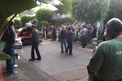 The threat of rain deterred Rayner Equipment Systems from spraying sealer with its PavementSaver II dual application machine, but contractors took advantage of the opportunity to test out the unit spraying water on the pavement.