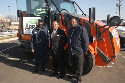 Pictured in front of one of the two Pelican CNG-fueled street sweepers are Gregory Harrelson, vehicle acquisition specialist, (left); Michael A. Carter, deputy director of public works (center); and Gerard Campbell, vehicle control officer (right), all with the District of Columbia.