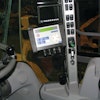 A Volvo L350 wheel loader is shown equipped with a VEI loader scale.