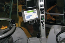 A Volvo L350 wheel loader is shown equipped with a VEI loader scale.