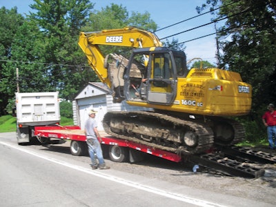 Rueben Schwartz regularly hauls a John Deere 160 excavator and a John Deere 750 dozer on his Rogers TAG25XXL trailer.