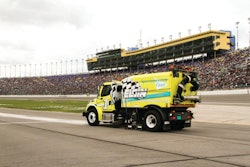 Elgin Sweeper collaborated with the California Motor Speedway, testing to develop a new side-air blast nozzle. To verify the sweeper will operate effectively on the steep banks and inclines associated with various racetracks around the country, Elgin conducted additional testing for maximum tilt angle at the Caterpillar Inc., research facility in Peoria, IL. An in-cab angle measurement system on the sweeper audibly and visually alerts the operator when steep incline conditions approach the maximum tilt angle.