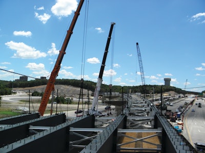 Barnhart Crane & Rigging Co. had to ensure that the cranes could reach far enough, yet stay within their rated capacity, when setting girders for the flyover ramps.