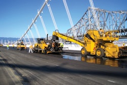 The Weiler E1250A RTV helped the paving train move continuously and consistently.