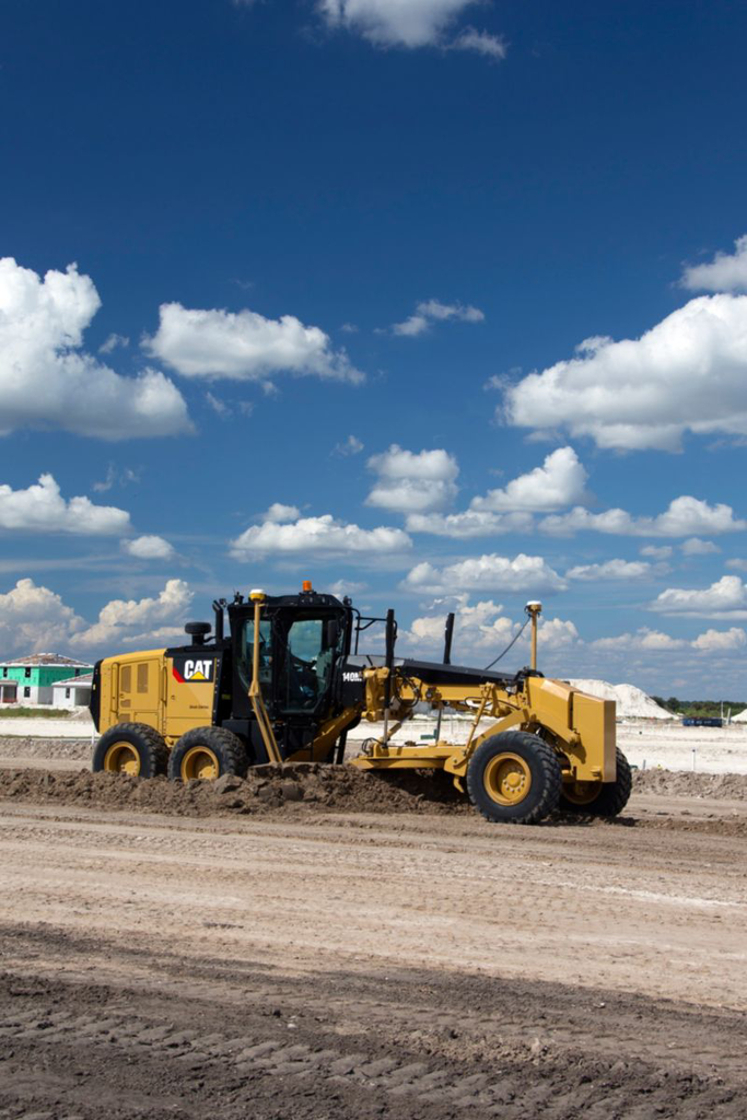 Cat M Series 3 Motor Grader Grading Dirt