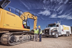 Cat Dealer Technician Consults With Equipment Manager