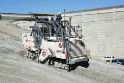 For the ramp construction, the compact Wirtgen 2200 SM was used with the optimal cutting depth of 10 in. in this terrain. Cut material was disposed of in windrows.