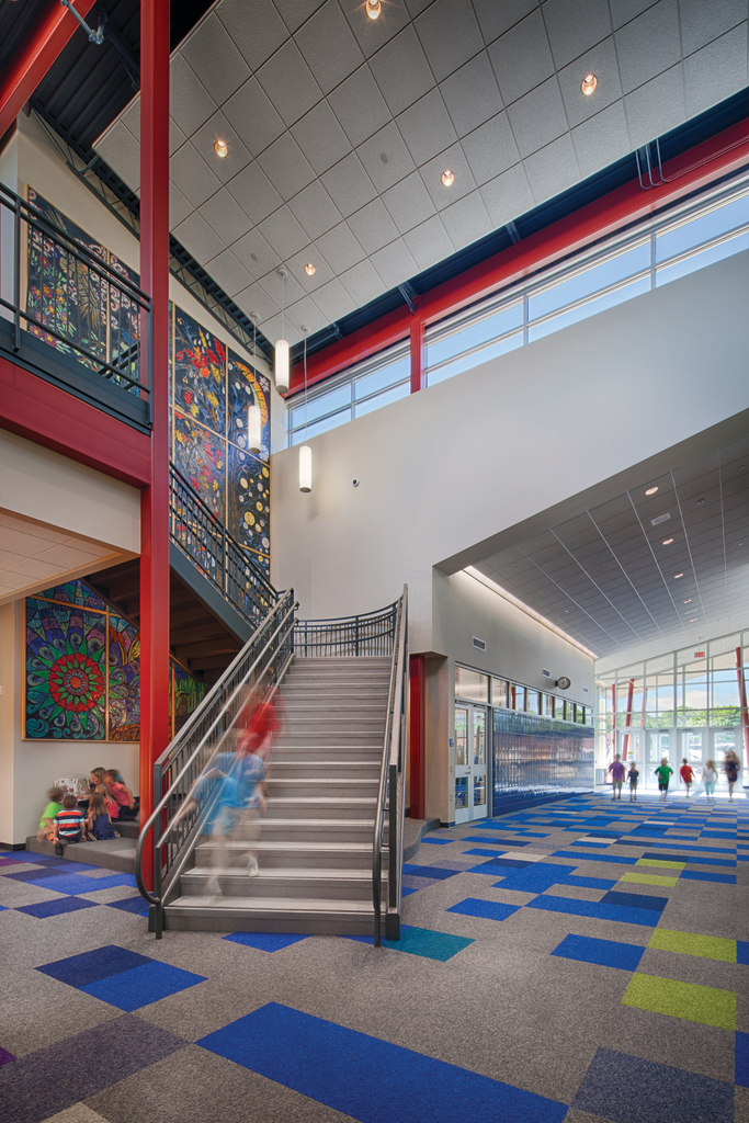 A mosaic mural leading up the stairs is one of the first design elements that grace the entrance to the Prospect Elementary school. The kids helped create the mural.