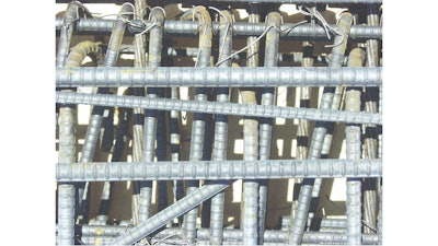Where are the obstruction-free vertical runs of 4' x 6' minimum cross section to permit vibrator insertion?