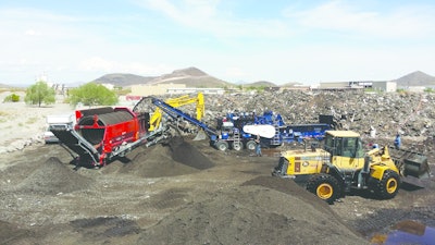 JML Energy Resources LLC in Brentwood, TN, uses the Peterson 4700B Horizontal Grinder for daily production of recycled asphalt shingles (RAS).