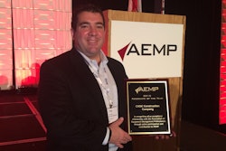 Pat Hunt, Case Construction Equipment's Director of Strategic Accounts, accepts the Associate of the Year award at the annual AEMP conference in Orlando.
