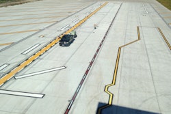 Project cost was estimated around $30 million with the striping subcontract around about $60,000 for Brian Boatner, president of Roads & Runways, and his son Ben. They completed 70,000 sq. ft. of striping in a short two week timeframe.