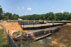 “The paving of tennis courts, sports courts, and running tracks is what we call the plastic surgery of paving,” says Eric Finley, owner of Finley Asphalt. “The smoothness tolerance is typically ¼” when checked with a 10’ straight edge, and of course no standing water. The goal is to have the asphalt surface as flat as possible with just enough slope to drain the water off. Typically most parking lots are designed with 1.5% to 2% slope. Sports surfaces range from .83% to 1%.”