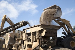 Any overs from the crushing process are fed from the middle-deck screen back to the impactor, where it is crushed again to make a finished product. This product is then conveyed and stockpiled to be added to the asphalt plant.