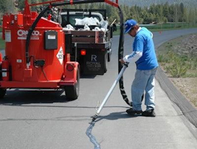 In cold temperatures, the pavement contracts and cracks open to their widest point. In hot temperatures, the pavement expands and closes the cracks. This is why spring and fall are considered the optimal time for crack repair.