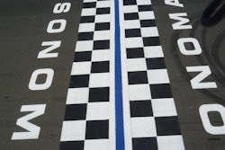 The Start/Finish line is the last item striped; the racetrack itself is bordered with 5-in. yellow lines on both sides of the track, which amounts to four miles of striping all done with a walk-behind unit.