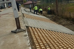 “The slope needed to be stabilized beyond the parking lot because of the steep grade and concerns about erosion,” says Robby Oswald, owner of Bomanite of New Orleans. Grasscrete was the ideal solution because it forms a concrete lattice that allows grass or other vegetation to grow within the voids. In this case it was covered with sod.”