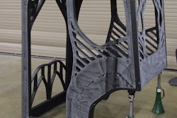 The completed 3D printed excavator cab was printed with an additive manufacturing machine that used carbon fiber-reinforced acrylonitrile butadiene styrene (ABS) plastic.