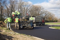 The asphalt mix design was special to help prevent the asphalt from tearing or raveling due to the strong friction and heat generated from the tires on the racing carts. 255 tons of asphalt binder and 255 tons of asphalt surface was used.