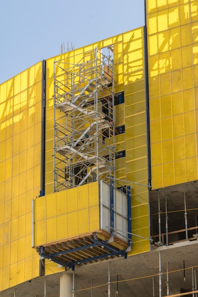Doka's Super Climber self-climbing core system allows inside and outside forms to be hung from the gantry allowing the contractor to roll forms away from core walls while erecting and stripping.