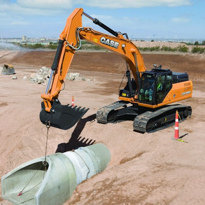 The operator should be be able to maintain visibility into the hole or trench as the load is being lowered. Position the machine so the lowering is done over the end of the machine and not over the side.