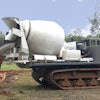 Terramac will unveil a new, compact-sized crawler carrier model and display its latest specialty unit, the RT9 equipped with a concrete mixer.