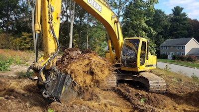 In addition to the tiltrotator, Gardocki purchased engcon digging and grading buckets and an SK sorting grapple.