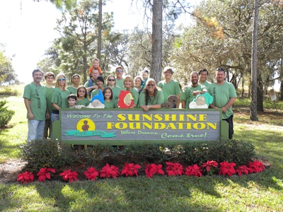 The Asphalt Restoration Technology Systems team, which donates personnel, funds and materials to Sunshine Foundation Dream Village, Davenport, FL. Among other things the Village grants ill and physically challenged children and their families all-expense-paid, one-week vacations to Orlando area theme parks and attractions as a getaway from their routine of hospitals, therapies and medical treatments.