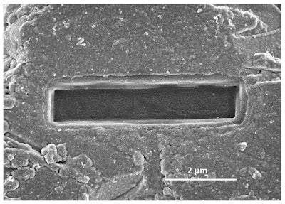 Figure 6b: Images of the gap in C3S sample after 4 hours of hydration exposed to a) pure water, b) 60mM sodium aluminate at pH 12.5: low dissolution, c) 60mM sodium aluminate at pH 13: large dissolution, d) 0.3% superplasticizer: low dissolution compare to pure water from Suraneni and Flatt [20]