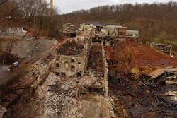 Neuber Demolition & Environmental Services had to set up differently for its demolition project because it had to be cautious to prevent any of the damaged structure from falling into the river below.
