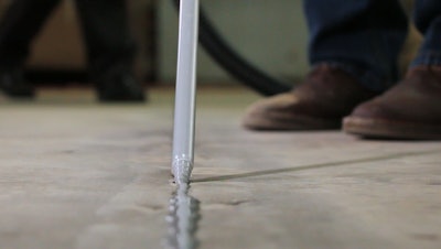 Today's joint fillers are intentionally over-applied in warehouse and industrial applications, and flush-trimmed with a floor razor to keep out debris and protect slab edges from spalling.