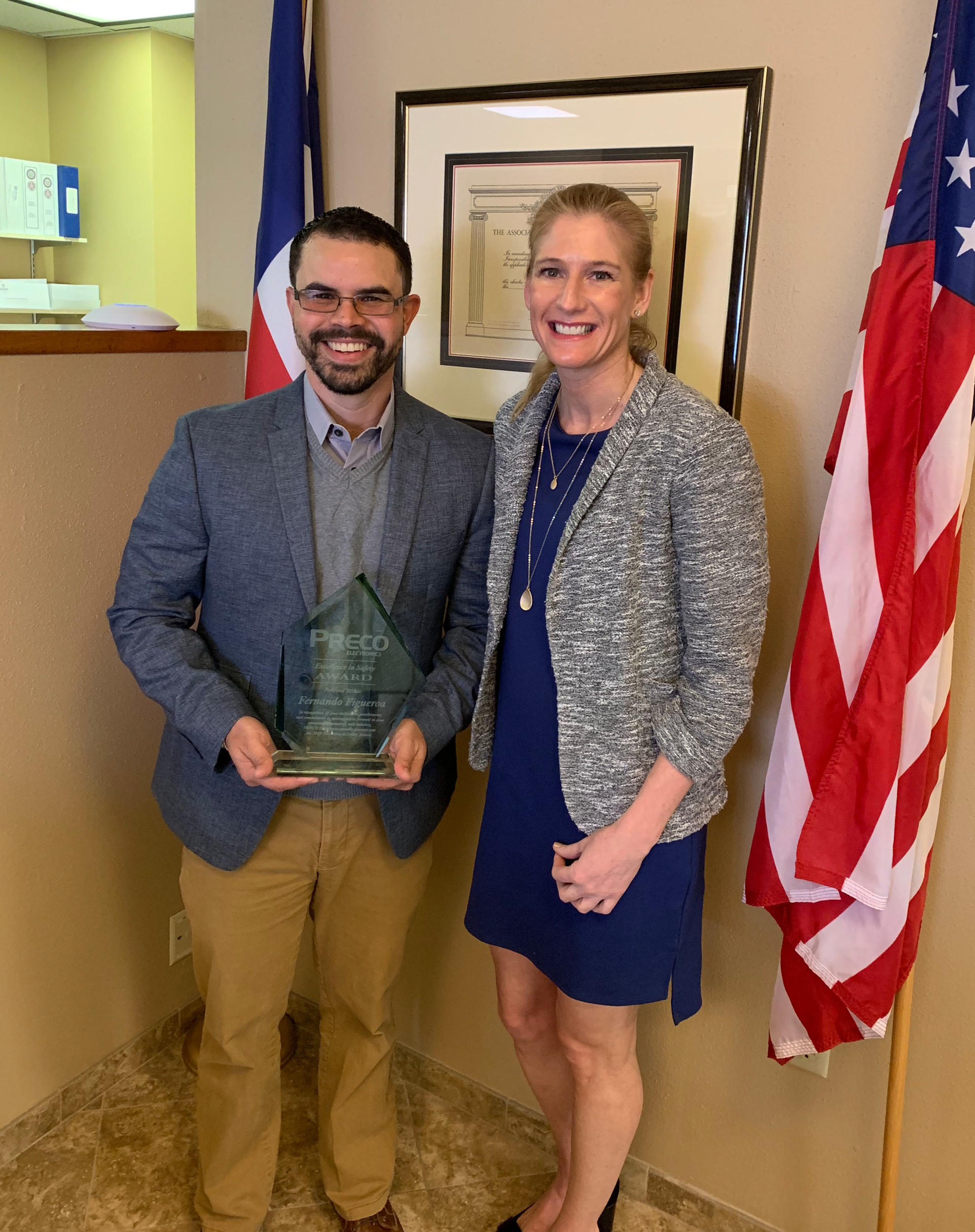 Fernando Figueora (left) is the recipient of the 2018 Excellence in Safety Award. He is shown with PRECO's Tamara Humpherys.