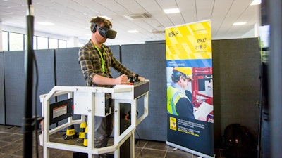Serious Labs' VR simulator in use in the IPAF booth at Vertikal Days