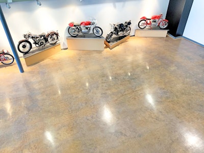 Layers of paint, epoxy, carpeting, luxury vinyl tile and vinyl composite tile once covered the floor at the Moto Museum in St. Louis, which houses some of the rarest motorcycles in the existence.