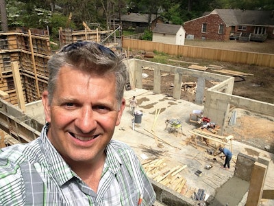 Eric Tabor and his company, The Elm Group, are focusing on constructing the exterior walls of new homes with concrete. His goal is to provide affordable structures that can resist the most violent extreme weather events.