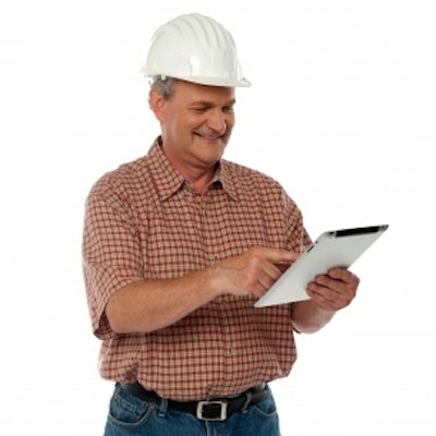 Construction Worker With Tablet Freedigitalphotos