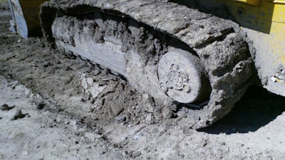 Clean the undercarriage at the end of the shift. This is what happens when mud is allowed to freeze and harden in the undercarraige.