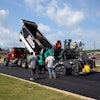 ST Bunn Construction uses Super 1703-3i wheeled paver on parking lot.