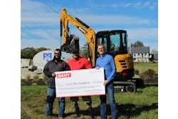 SANY America presented a check and an SY35U excavator to The Travis Mills Foundation at their facility in Rome, ME. From left to right: Joe Duplessis, Northeast District sales manager for SANY America; Travis Mills, founder of The Travis Mills Foundation; and Ben Miller, vice president of sales for construction equipment, SANY America