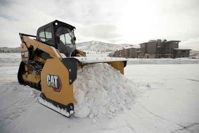 The first and most common method loaders are usually equipped for snow removal is is to push or scrape to clear the snow. This is done using a plow blade, a larger snow pusher and occasionally still a bucket. Snow pushers are wider and taller than a bucket, so they are capable of clearing more area quickly as shown by this Caterpillar 289D Compact Track Loader with a snow pusher.