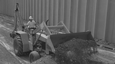 John Deere first started backhoe-loader production with the introduction of the JD310 model in 1971.